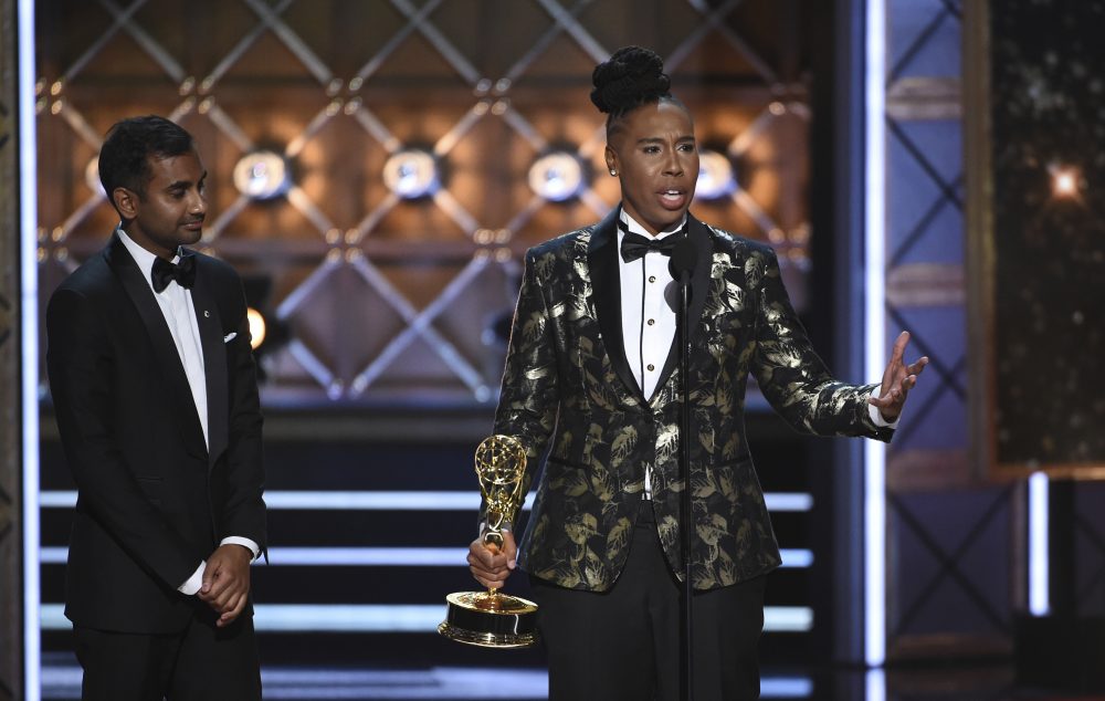 Aziz Ansari, left, and Lena Waithe accept the award for outstanding writing for a comedy series for the &quot;Master of None&quot; episode &quot;Thanksgiving.&quot; (Phil McCarten/Invision for the Television Academy/AP)