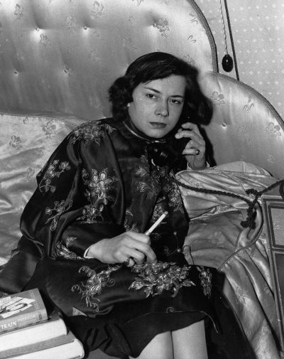 Patrica Highsmith at age 27 in her London apartment. (AP)