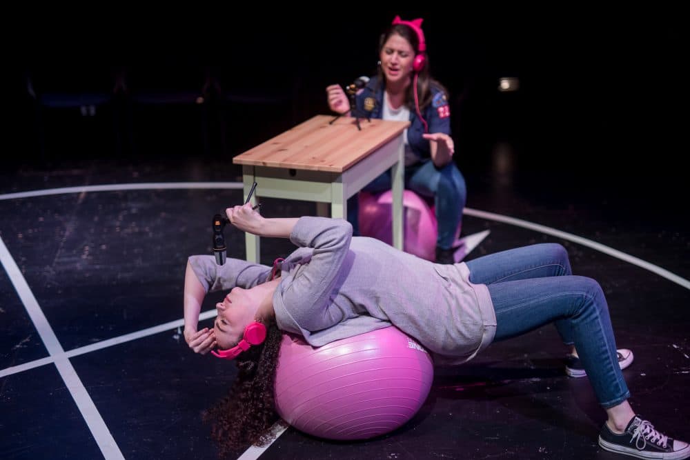 Alexis Scheer (background) and Kara Arena (foreground) as radio hosts in &quot;The Weird.&quot; (Courtesy Nile Hawver/Nile Scott Shots/Off The Grid Theatre Company)