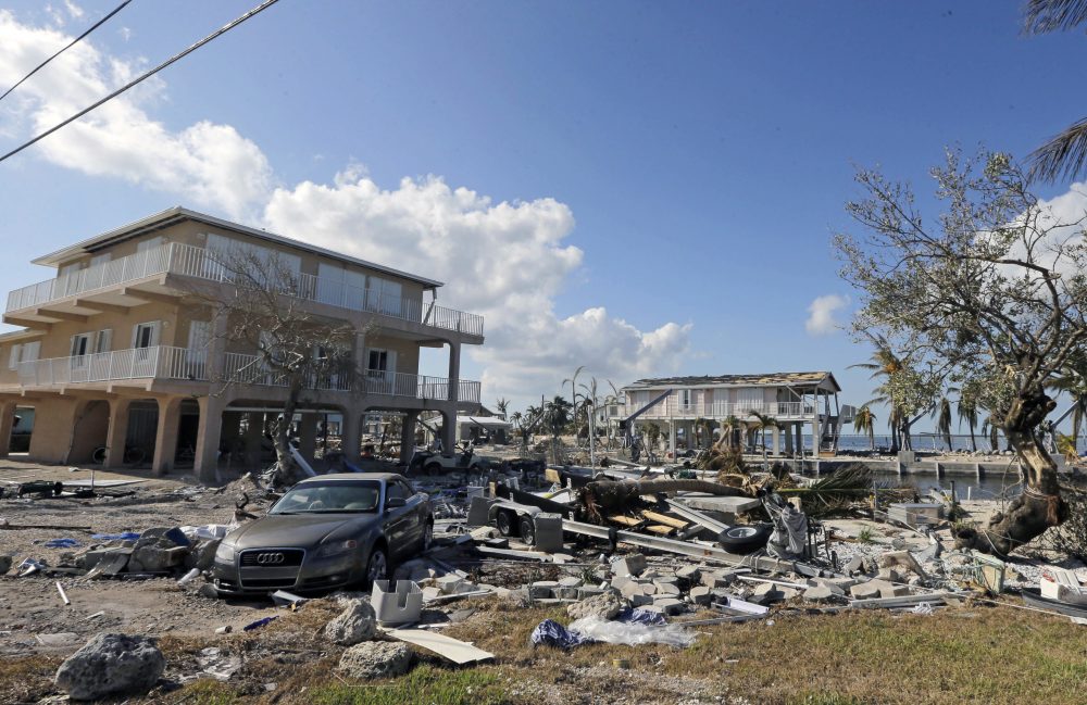 Debris and a car damaged during the storm are shown in the aftermath of Hurricane Irma on Sept. 13 in Big Pine Key, Fla. (Alan Diaz/AP)