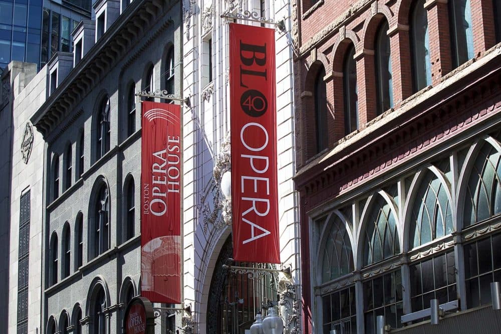 Banners for the Boston Lyric Opera's 40th anniversary hang outside the Boston Opera House in 2016. (Jesse Costa/WBUR)