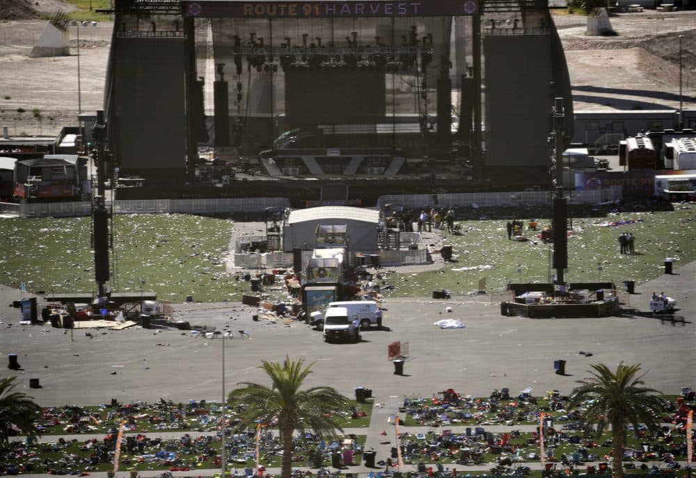 Debris is strewn through the scene of a mass shooting at a music festival near the Mandalay Bay resort and casino on the Las Vegas Strip, Monday, Oct. 2, 2017, in Las Vegas. (John Locher/AP)