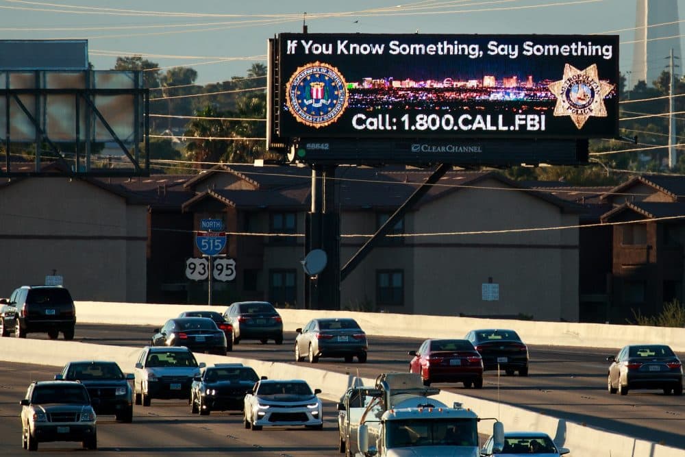 Vehicles drive past a billboard featuring a Federal Bureau of Investigation tip line phone number on Interstate 515, Oct. 7, 2017, in Las Vegas. (Drew Angerer/Getty Images)