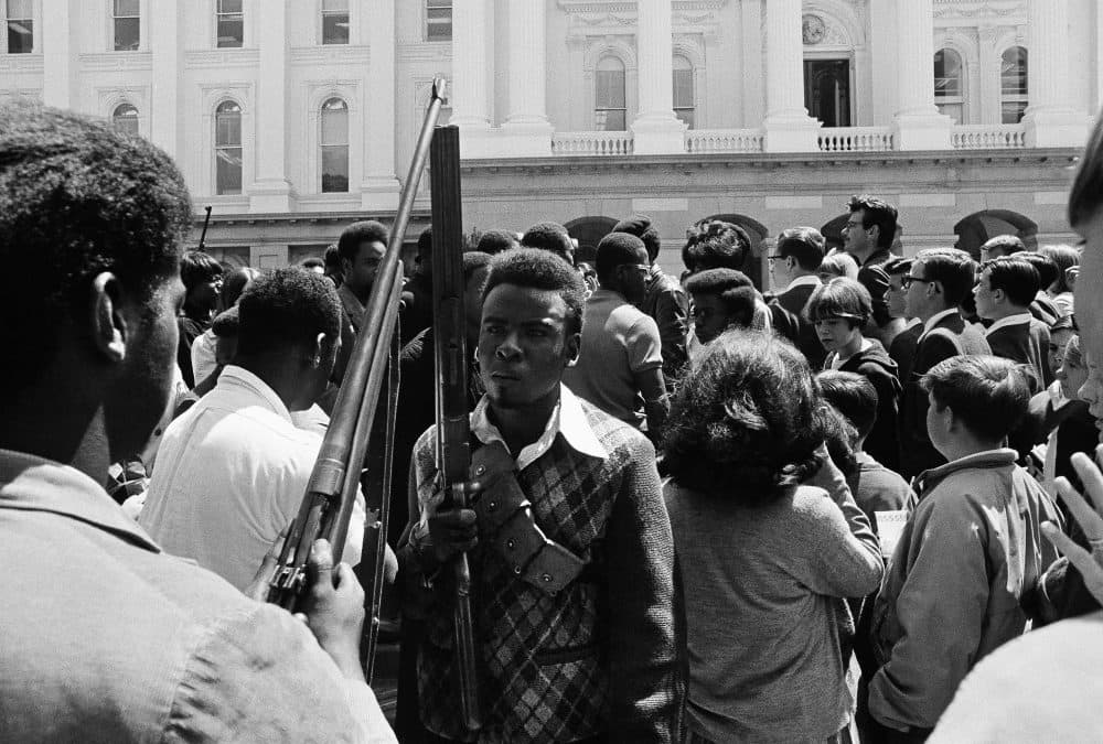 Armed members of the Black Panther Party leave the Capitol in Sacramento on May 2, 1967. (AP)