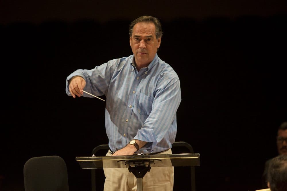 Maximiano Valdés, music director of the Puerto Rico Symphony Orchestra, conducts the symphony during a rehearsal. (Jesse Costa/WBUR)