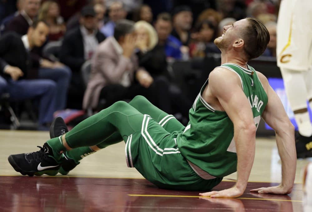 Boston Celtics' Gordon Hayward grimaces in pain after breaking his left ankle in the first half of an NBA basketball game against the Cleveland Cavaliers. (Tony Dejak/AP)