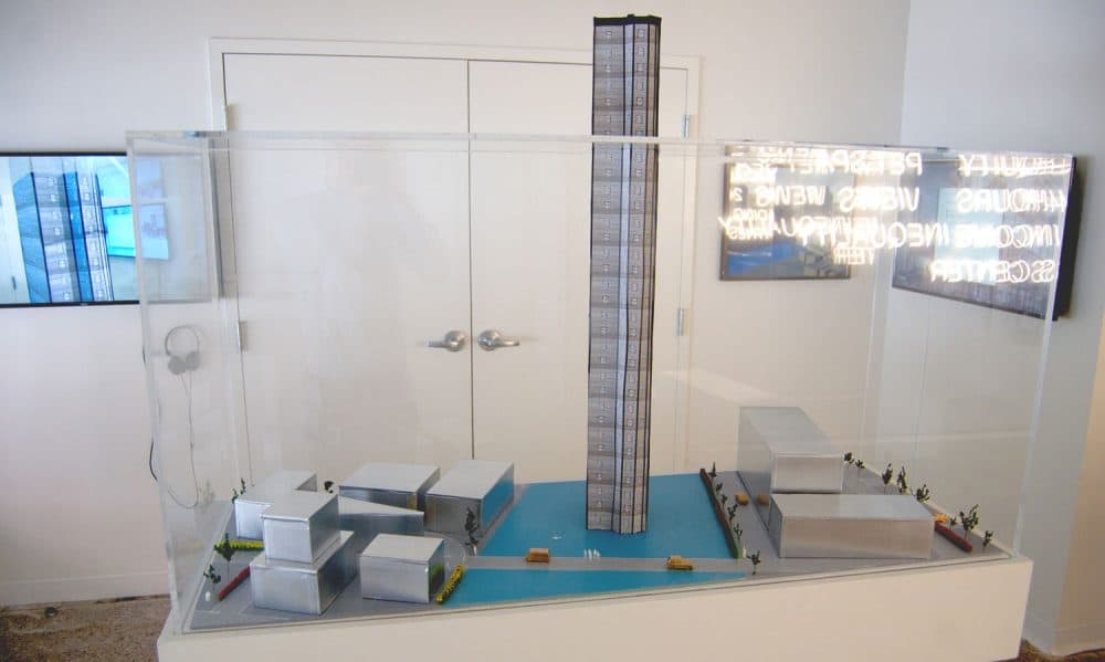 A model of Pat Falco's proposed &quot;Luxury Waters&quot; condo tower. (Greg Cook/WBUR)