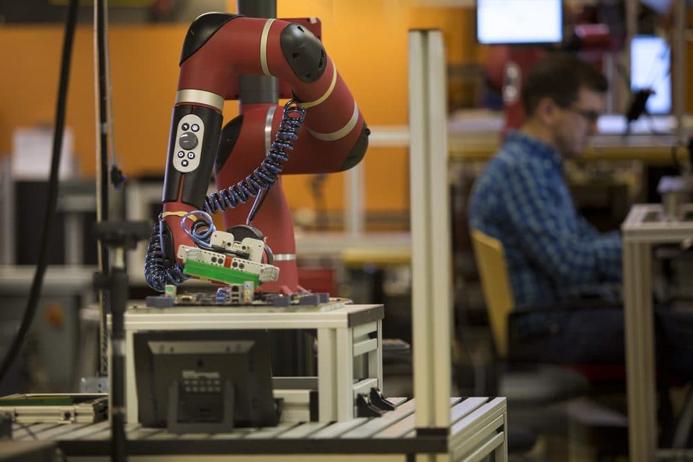 &quot;Our robots do simple, repetitive tasks,&quot; Brooks explained. (Jesse Costa/WBUR)