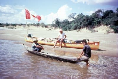 Dana and two children on the Orinoco River in Venezuela. (Don Starkell)