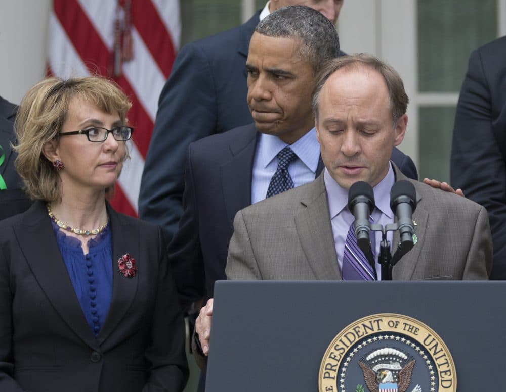Barden speaks in the Rose Garden of the White House on April 17, 2013, as President Obama and former Rep. Gabby Giffords look on. (Carolyn Kaster/AP)