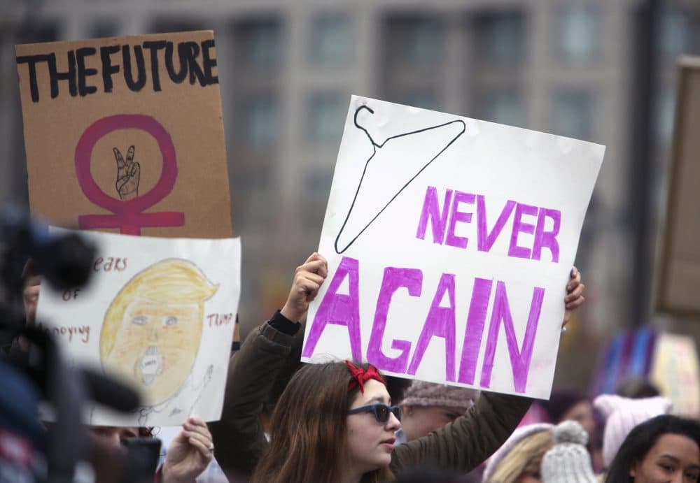 Protesters prepare to rally at the Women's March Saturday, Jan. 21, 2017 in Philadelphia. The march was held in solidarity with similar events taking place in Washington and around the nation. (Jacqueline Larma/AP)