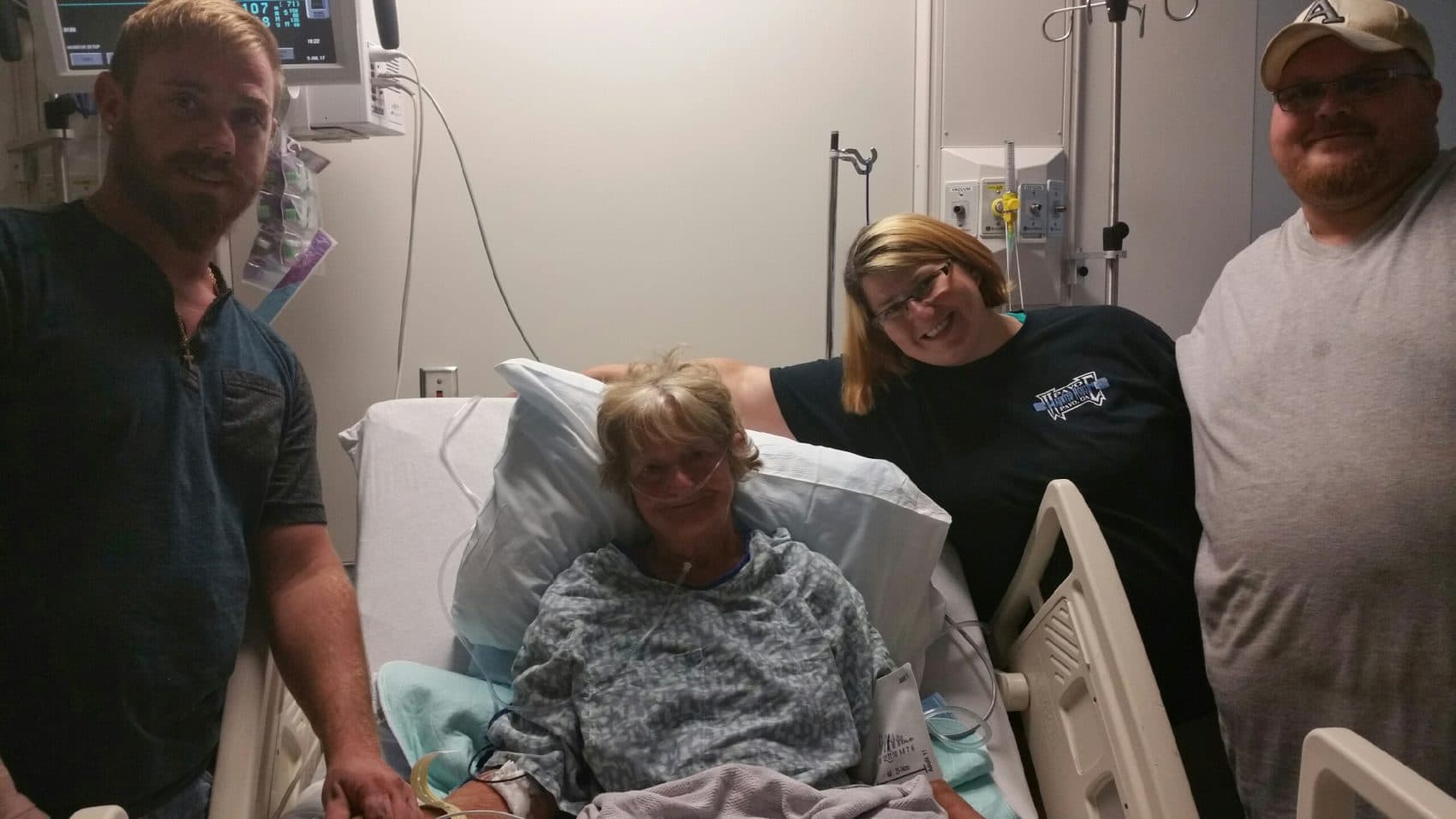 Roberta's mother, Barbara Franz, center, with Roberta's nephew, Justin, and her husband, Bryan. Barbara had a heart attack during the rescue and is still dealing with health repercussions. (Courtesy of Roberta Ursrey)