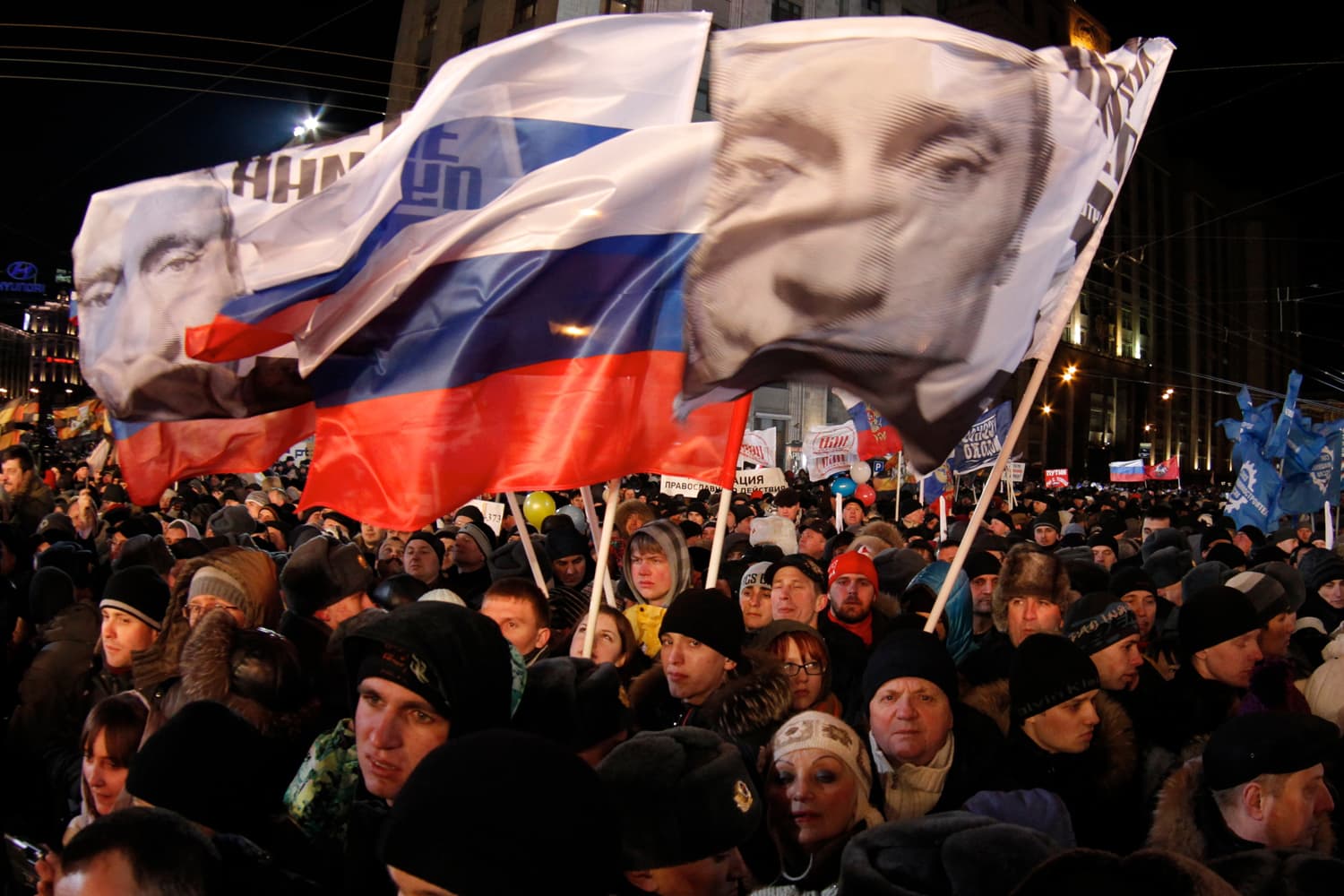 Supporters of Russian Prime Minister Vladimir Putin rally at Manezh square outside Kremlin, in Moscow, Russia, Sunday, March 4, 2012. (Ivan Sekretarev/AP)