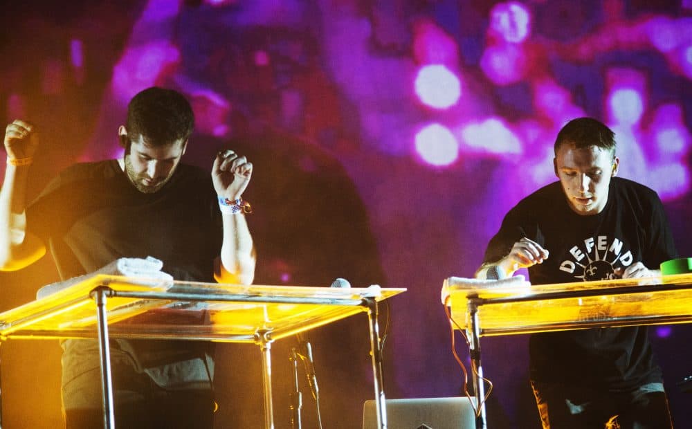 Harrison Mills and Clayton Knight of the American electronic music duo Odesza perform on day three of the Coachella Music Festival in Indio, Calif., in April 2015. (Robyn Beck/AFP/Getty Images)