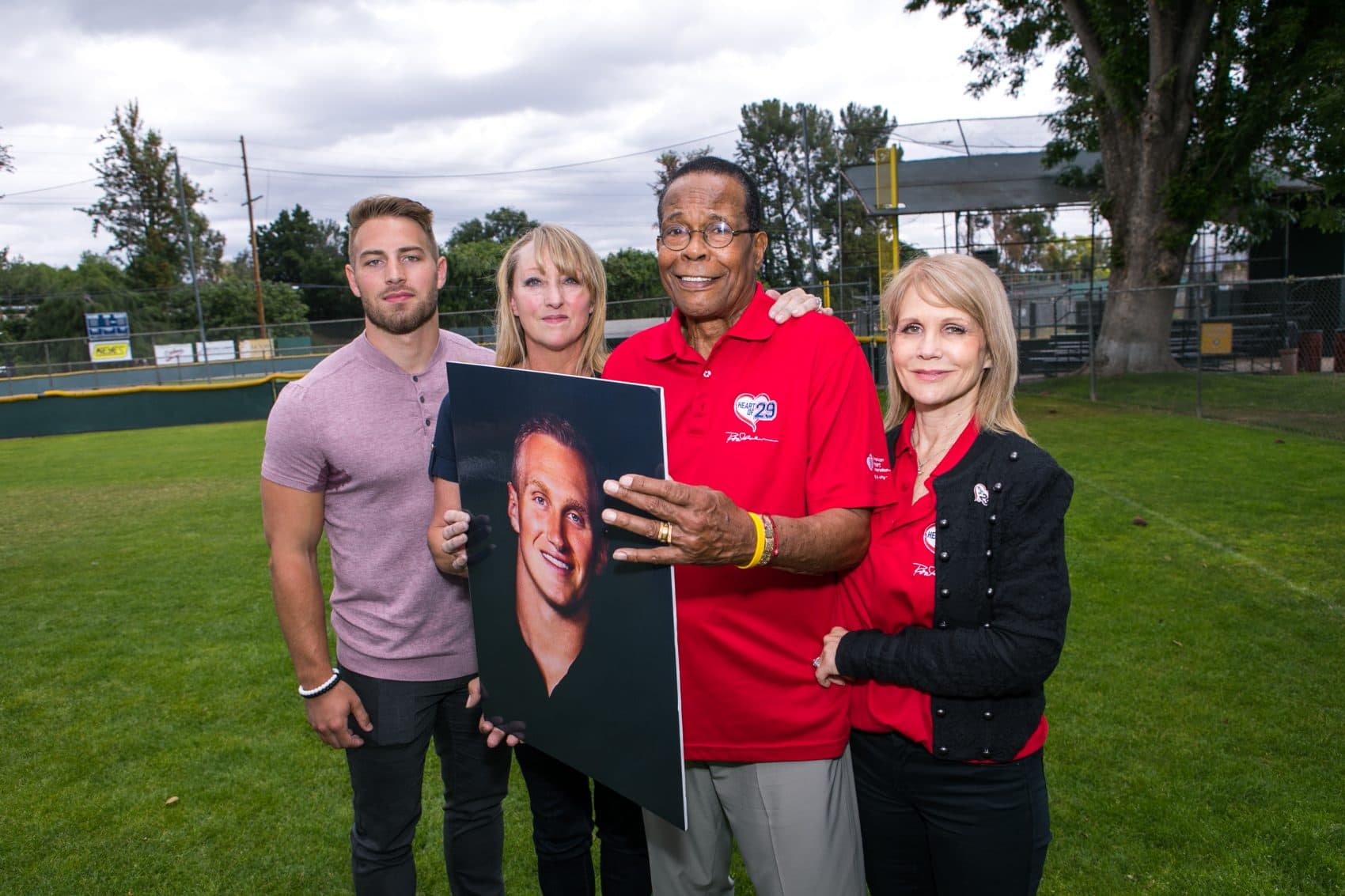 Konrad Reuland was honored by Rod and Rhonda Carew (third and fourth from left), after donating his heart and a kidney to the baseball legend. (American Heart Association)