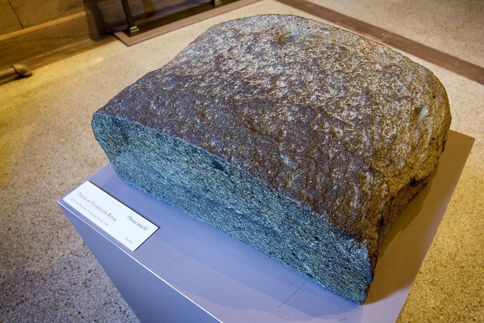 A segment of Plymouth Rock in the Pilgrim Hall Museum. (Robin Lubbock/WBUR)