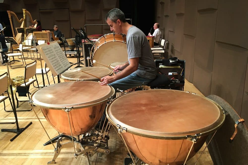 Timpanist Tim Genis during rehearsal at Osaka Festival Hall. (Andrea Shea/WBUR)