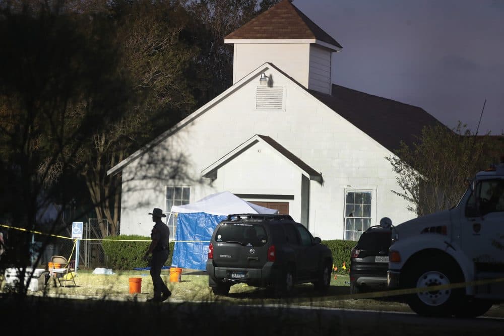 Law enforcement officials continue their investigation at First Baptist Church of Sutherland Springs as the sun begins to rise on Nov. 6, 2017 in Sutherland Springs, Texas. (Scott Olson/Getty Images)