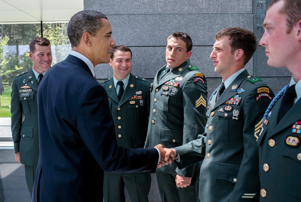 President Obama greets Cory Remsburg and other Army Rangers in Normandy on June 6, 2009. (Courtesy of Little, Brown and Company/Pete Souza)