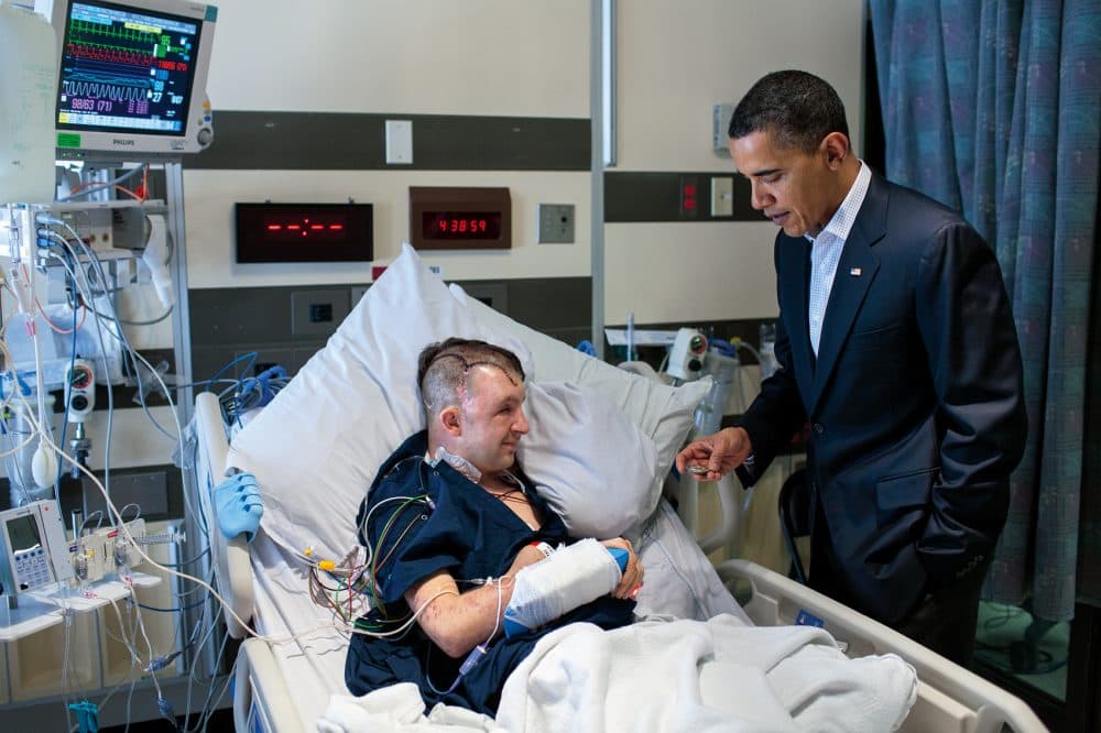 President Barack Obama with Army Ranger Cory Remsburg at Bethesda Naval Hospital in Bethesda, Md., Feb. 28, 2010. (Courtesy of Little, Brown and Company/Pete Souza)