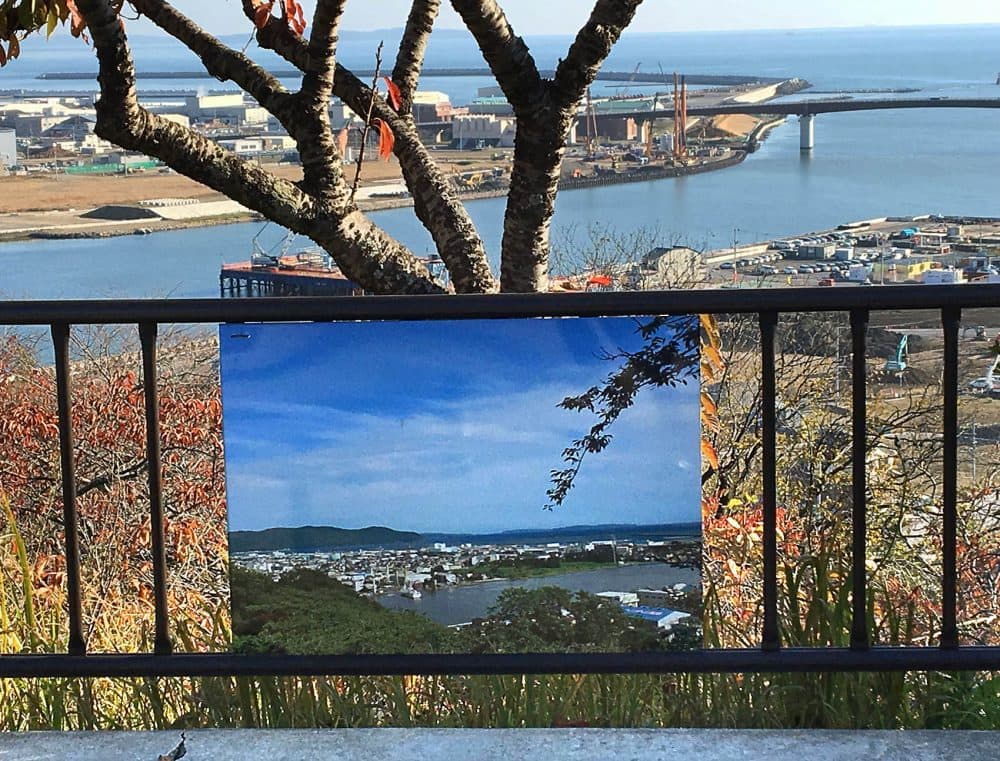 The photograph shows how the inlet in the background looked before the tsunami hit Ishinomaki in 2011. (Andrea Shea)