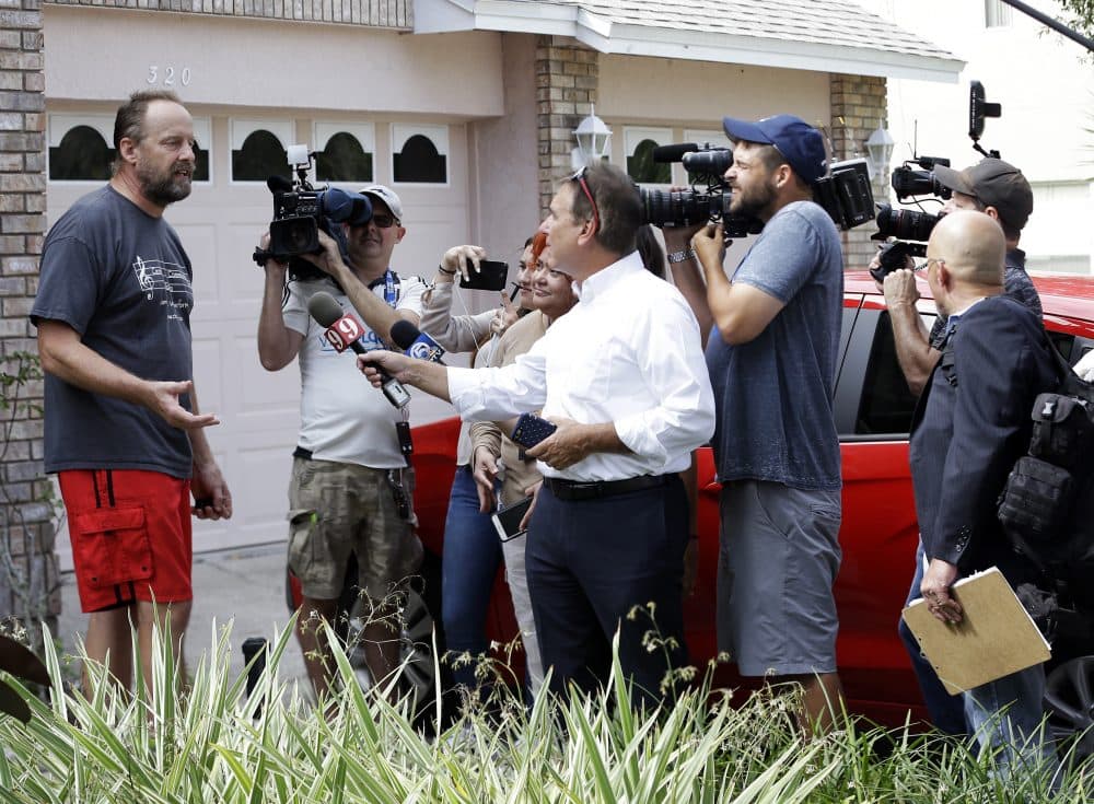 Eric Paddock, left, brother of Las Vegas gunman Stephen Paddock, speaks to members of the media outside his home, Monday, Oct. 2, 2017, in Orlando, Fla. (John Raoux/AP)