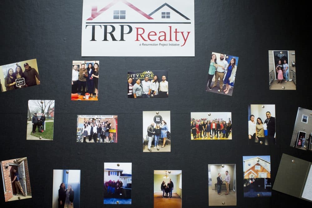 Photos of people closing on homes with TRP Realty, the Resurrection Project's in-house realty group, as part of the Full Circle Homes Initiative, pictured on Nov. 6, 2017, in Chicago. (Michelle Kanaar for Here &amp; Now)