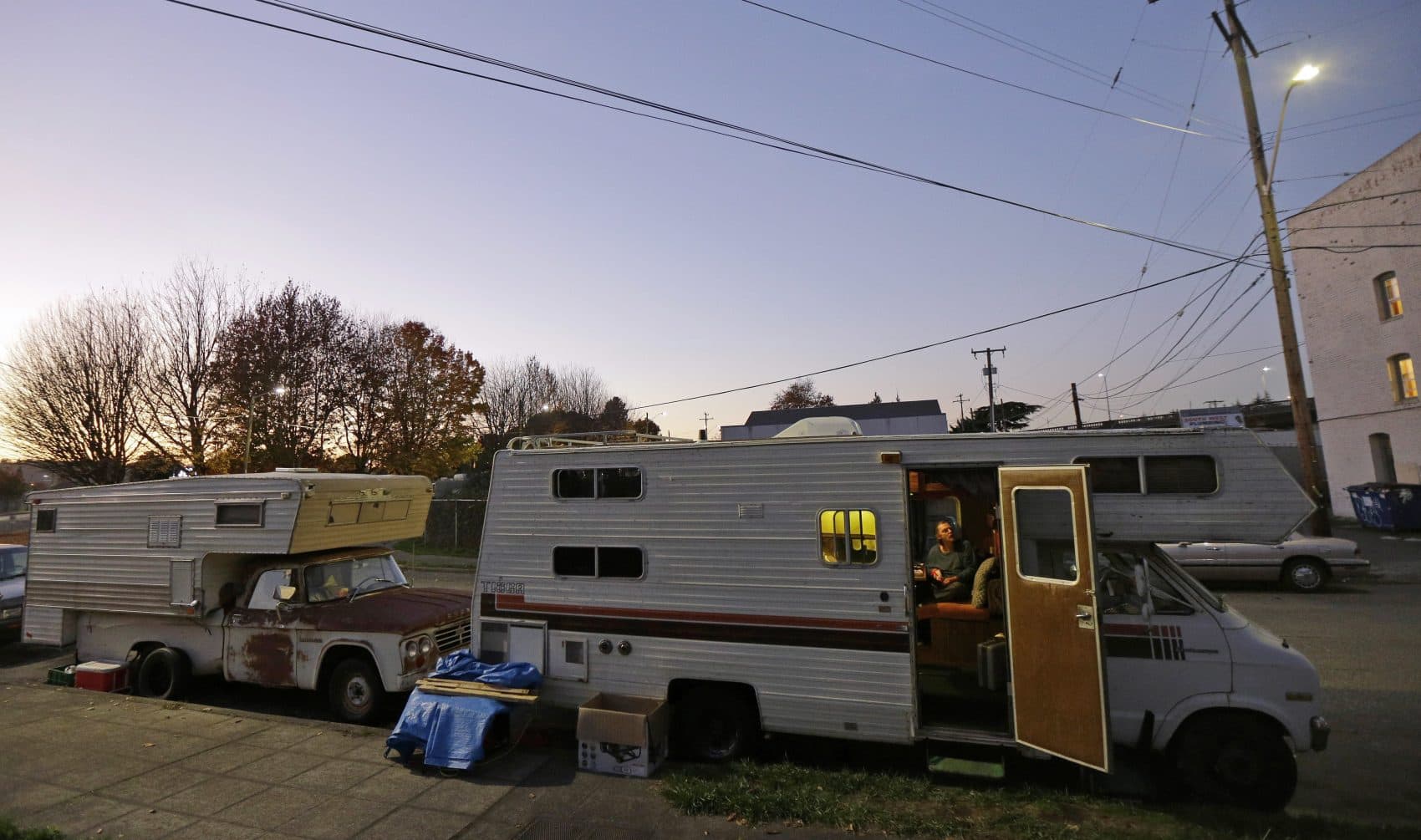 Timmings and his RV parked just north of Boeing Field, the King County International Airport, along with a group of fellow RV-dwellers who are periodically told by the city to move their vehicles -- even if just across the street -- or risk having them towed away. (Ted S. Warren/AP)