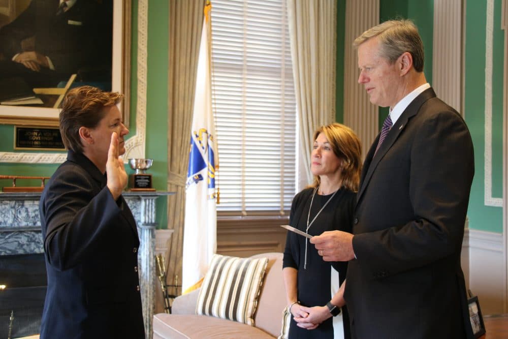 Gov. Charlie Baker, right, swears in Colonel Kerry Gilpin, left, with Lt. Gov. Karyn Polito. (Courtesy governor's office)