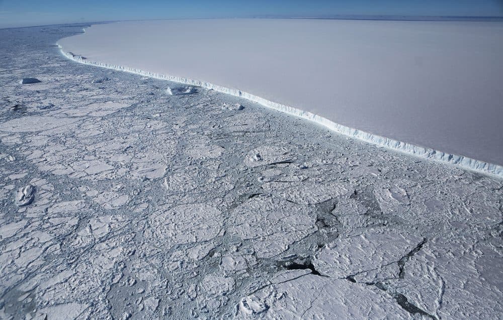 The western edge of the famed iceberg A-68 (TOP R), calved from the Larsen C ice shelf, is seen from NASA's Operation IceBridge research aircraft, near the coast of the Antarctic Peninsula region, on Oct. 31, 2017, above Antarctica. The massive iceberg was measured at approximately the size of Delaware when it first calved in July. NASA's Operation IceBridge has been studying how polar ice has evolved over the past nine years and is currently flying a set of nine-hour research flights over west Antarctica to monitor ice loss aboard a retrofitted 1966 Lockheed P-3 aircraft. (Mario Tama/Getty Images)
