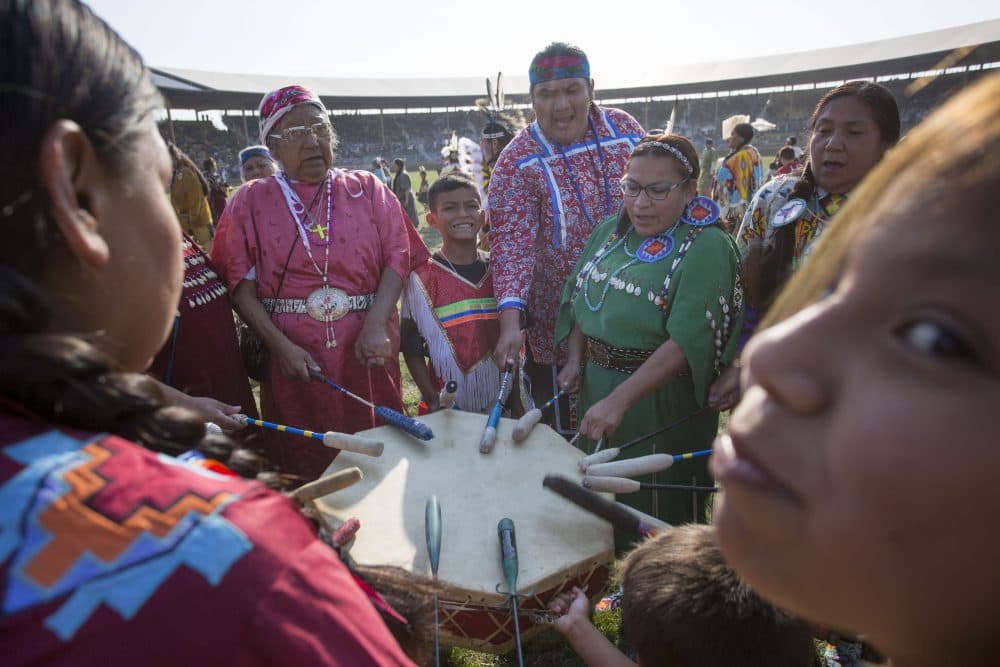 A group of drummers sing and beat a drum during a Native American dancing exhibition at the Pendleton Round-Up on Sept. 15, 2017 in Pendleton, Ore. The Pendleton Round-Up is a major annual rodeo featuring calf roping, bulldogging, bull riding, bronco riding and other events. (Natalie Behring/Getty Images)