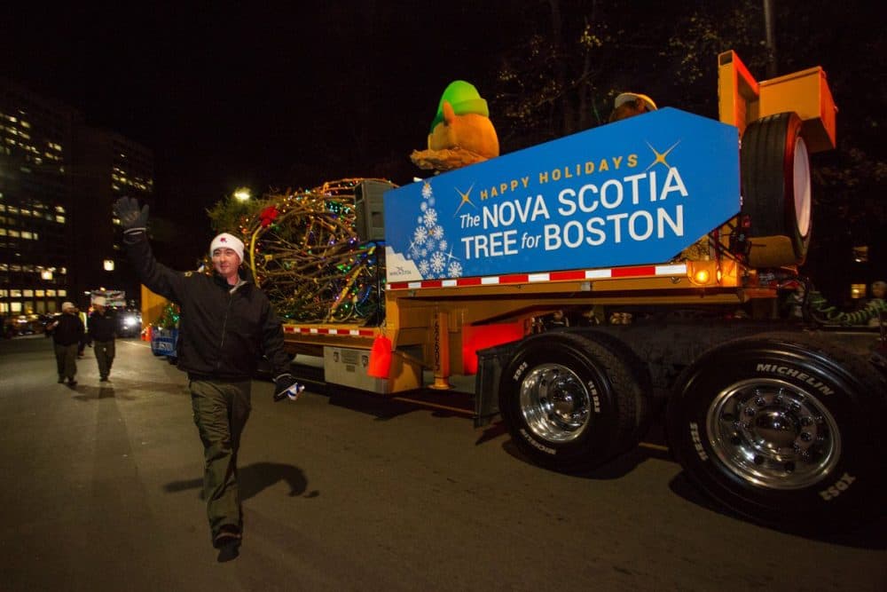 The Christmas tree sent from Nova Scotia to Boston to thank it for its role in helping after a deadly explosion 100 years ago rolls into Amherst, Nova Scotia. (Courtesy Photo @TreeForBoston)