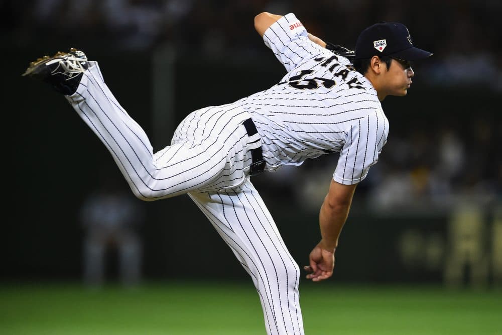 Japanese pitcher/outfielder Shohei Ohtani plans to jump to the MLB, and his agent is asking teams to explain how they plan to accommodate him. (Masterpress/Getty Images)