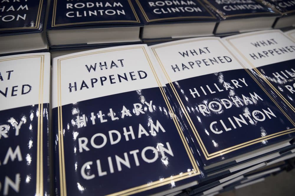 A box of Hillary Clinton's book &quot;What Happened&quot; are staged to be distributed outside the Warner Theatre in Washington, Monday, Sept. 18, 2017, as Clinton participates in a book tour event hosted by the Politics and Prose Bookstore. Clinton was in Boston Tuesday night on her book tour. (Carolyn Kaster/AP)
