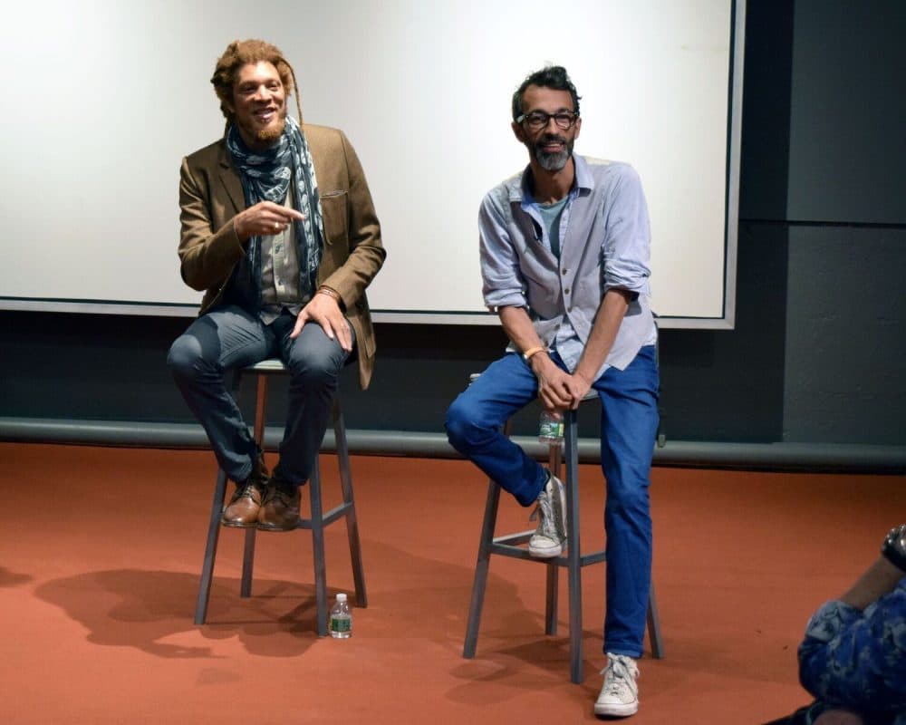 MIT Professor Fox Harrell (left) and photojournalist Karim Ben Khelifa worked together to create &quot;The Enemy&quot; in virtual reality. (Courtesy H.A. Erickson/MIT Museum)