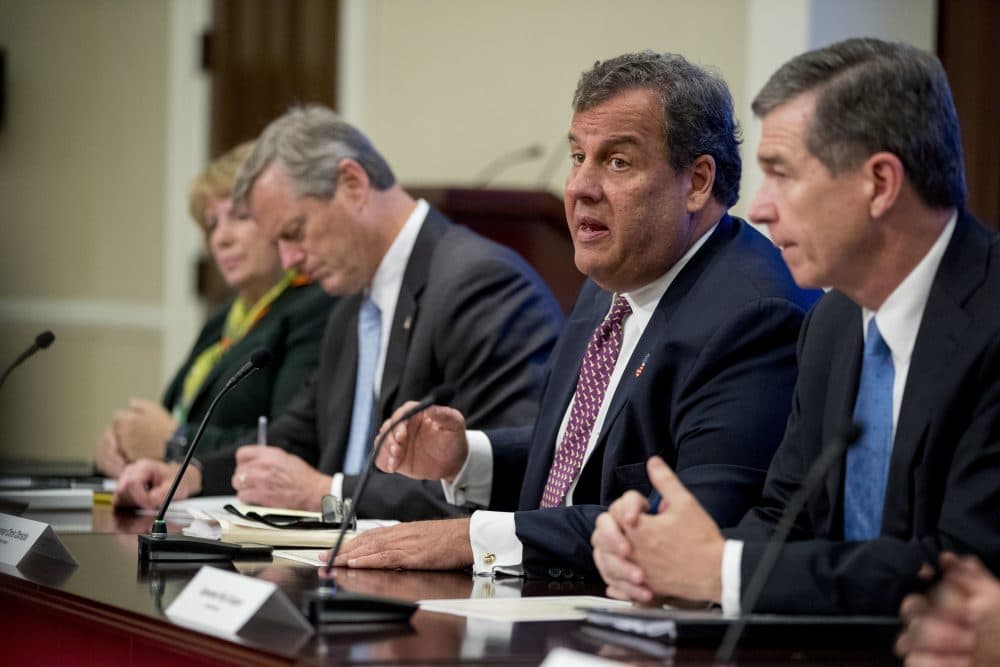 New Jersey Gov. Chris Christie, who is chairman of President's Commission on Combating Drug Addiction and the Opioid Crisis, accompanied by Massachusetts Gov. Charlie Baker, second from left, and N.C. Gov. Roy Cooper, right, speaks during a meeting in the Eisenhower Executive Office Building on the White House Complex, Wednesday, Sept. 27, 2017, in Washington. (AP Photo/Andrew Harnik)
