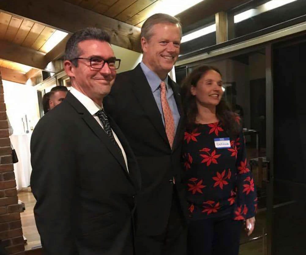 In this Oct. 23 photo provided by Tom Mountain, Martin Marro, left, and his wife, Mariana Dagatti, right, pose for a photo with Gov. Charlie Baker in Newton. The Argentine foreign ministry said Marro is recovering from his injuries at a Manhattan hospital after the NYC bike path attack. (Tom Mountain via AP)