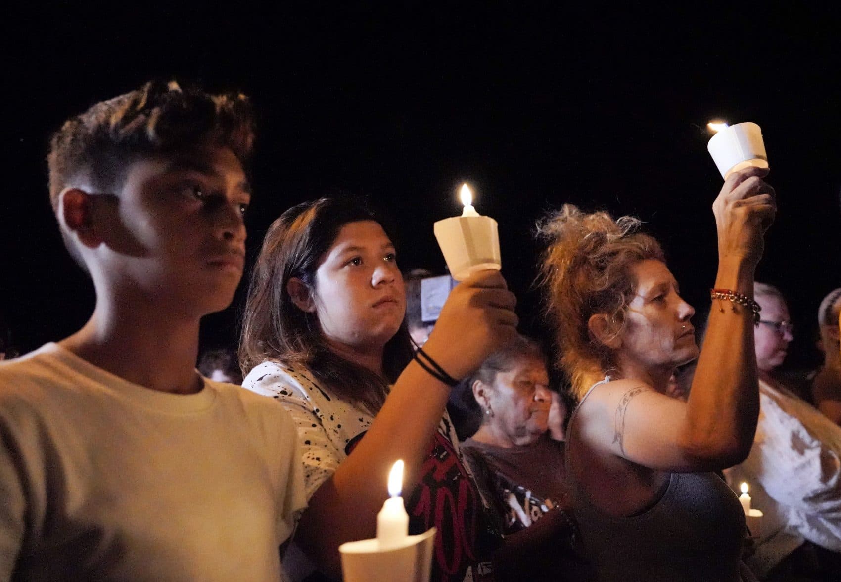 Mourners participate in a candlelight vigil held for the victims of a fatal shooting at the First Baptist Church of Sutherland Springs, Sunday, Nov. 5, 2017, in Sutherland Springs, Texas. (Darren Abate/AP)