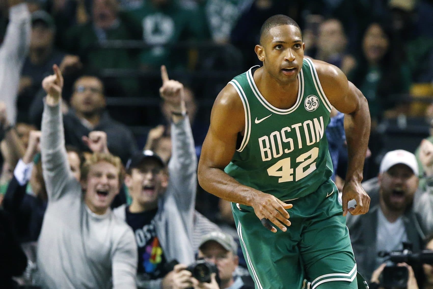 Boston Celtics' Al Horford heads court after scoring during the fourth quarter of an NBA basketball game against the Golden State Warriors in Boston, Thursday, Nov. 16, 2017. The Celtics won 92-88. (Michael Dwyer/AP)