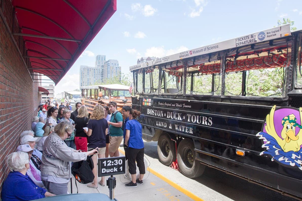 People waiting to get on duck boats at the Museum of Science. (Joe Difazio for WBUR)