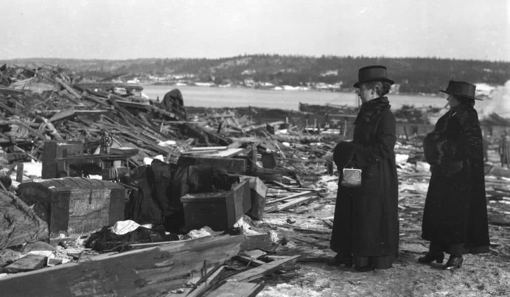 Women looking at debris after the Halifax explosion in December 1917. (Courtesy HarperCollins/City of Toronto Archives)