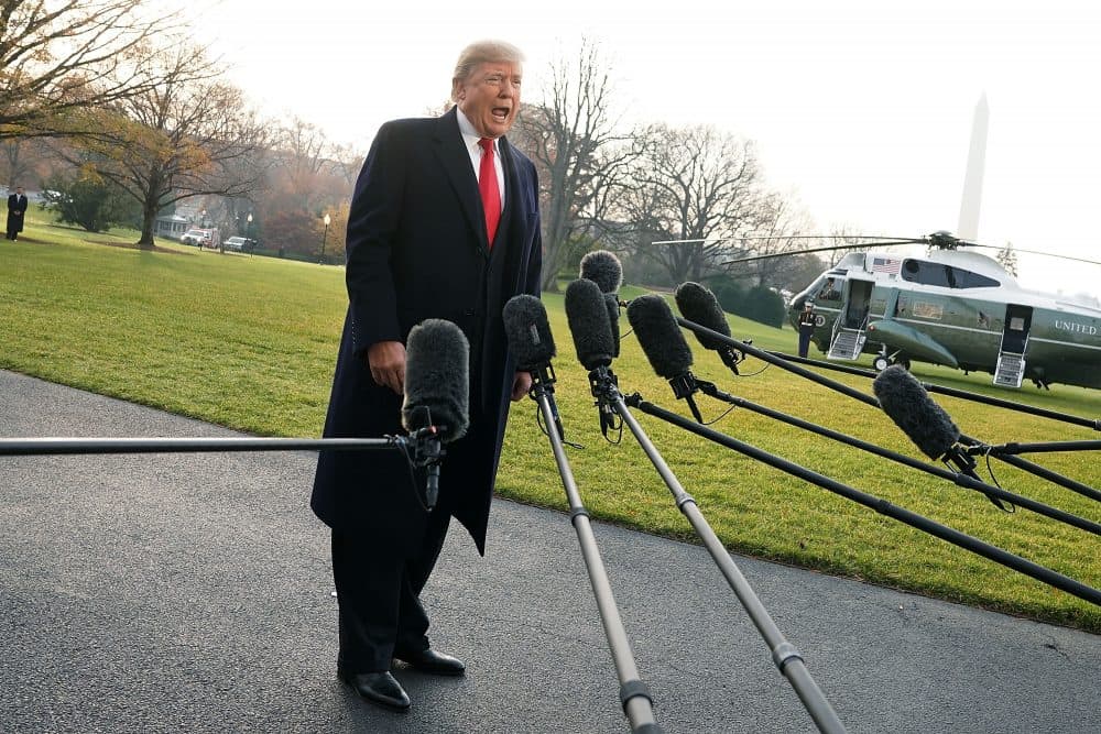 President Trump approaches members of the media to speak on former national security adviser Michael Flynn lying to the FBI, prior to his Marine One departure from the South Lawn of the White House on Dec. 4, 2017 in Washington, D.C. (Alex Wong/Getty Images)