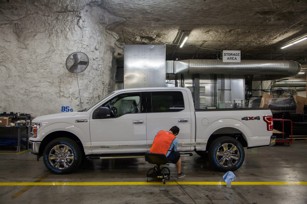 &quot;Automotive Alley&quot; in SubTropolis, where Ford Transit cargo vans and F-150 trucks are painted and upfitted for commercial sale. (Dean Russell/Here &amp; Now)
