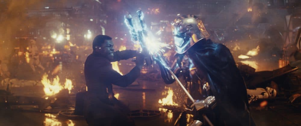 John Boyega as Finn battling Captain Phasma, played by Gwendoline Christie. (Courtesy Lucasfilm Ltd.)