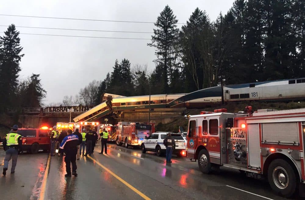 This photo provided by Washington State Patrol shows an Amtrak train that derailed south of Seattle on Monday, Dec. 18, 2017. Authorities reported &quot;injuries and casualties.&quot; The train derailed about 40 miles (64 kilometers) south of Seattle before 8 a.m., spilling at least one train car on to busy Interstate 5. (Washington State Patrol via AP)