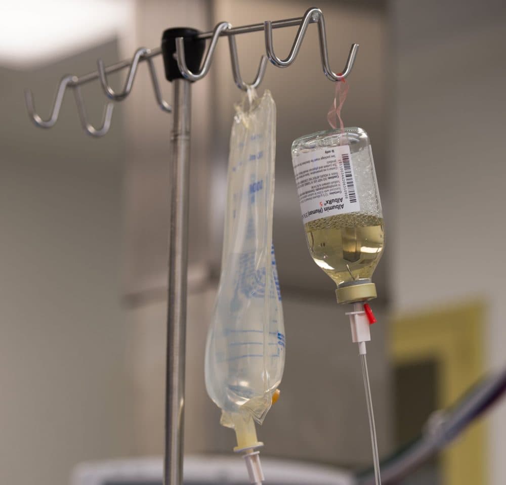 IV fluids hang inside an operating room during a kidney transplant surgery at MedStar Georgetown University Hospital in Washington, D.C. (Molly Riley/AP)