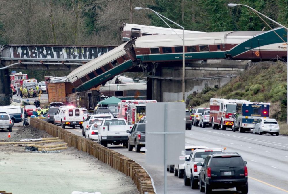 The scene of a portion of the Interstate 5 highway after an Amtrak train derailed from an overpass early Dec. 18, 2017 near the city of Tacoma, Wash. (Kathryn Elsesser/AFP/Getty Images)