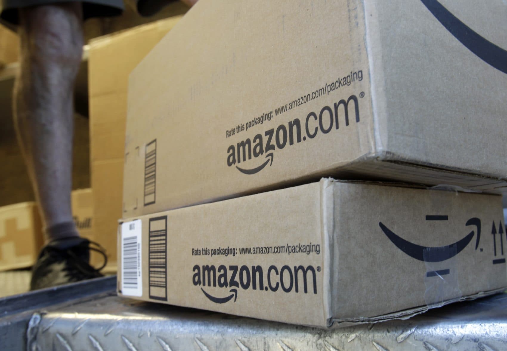 A United Parcel Service driver delivers packages from Amazon in Palo Alto, Calif., Thursday, June 30, 2011. (Paul Sakuma/AP)