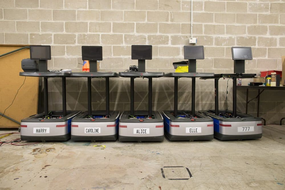 A fleet of autonomous mobile robot at the testing facility of 6 River Systems in Waltham. (Jesse Costa/WBUR)