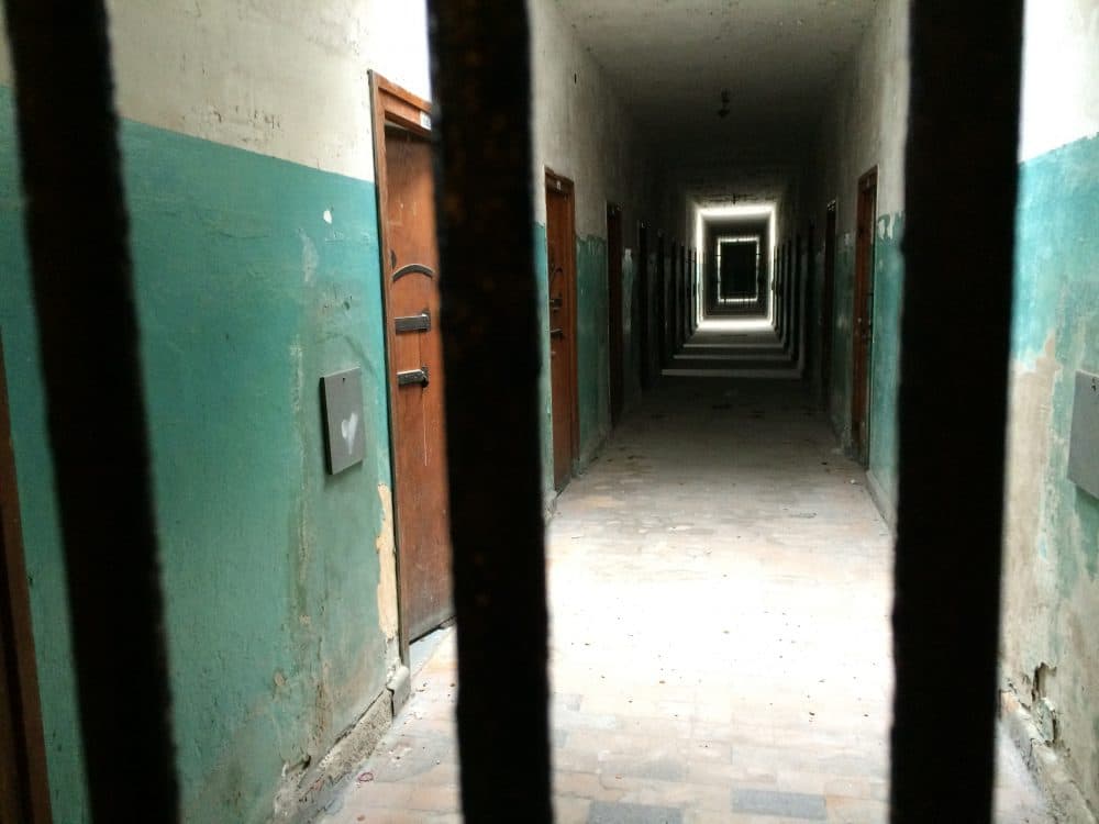 Basement detention cells in the former Dachau concentration camp bunker, Germany, 2015. (Courtesy Andrea Pitzer)